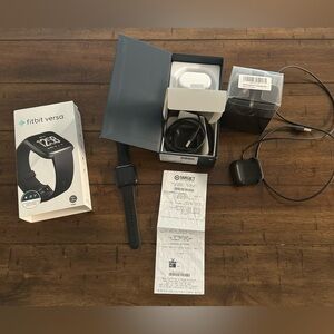 Fitbit Versa with 3 chargers